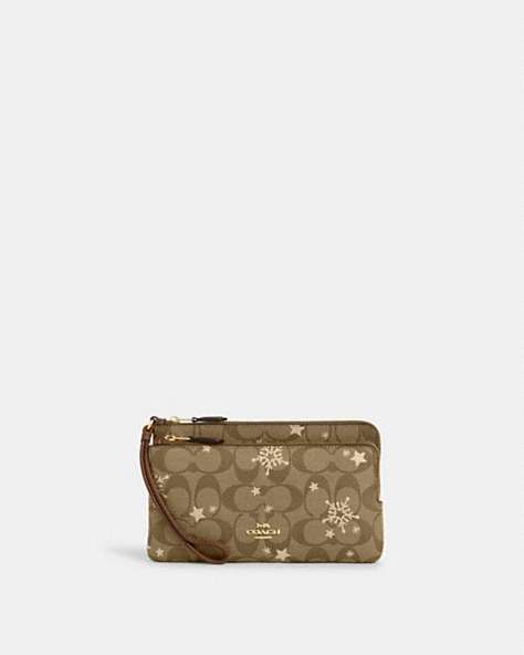 COACH®,DOUBLE ZIP WALLET IN SIGNATURE CANVAS WITH STAR AND SNOWFLAKE PRINT,Coated Canvas,Mini,Im/Khaki Saddle/Gold Multi,Front View