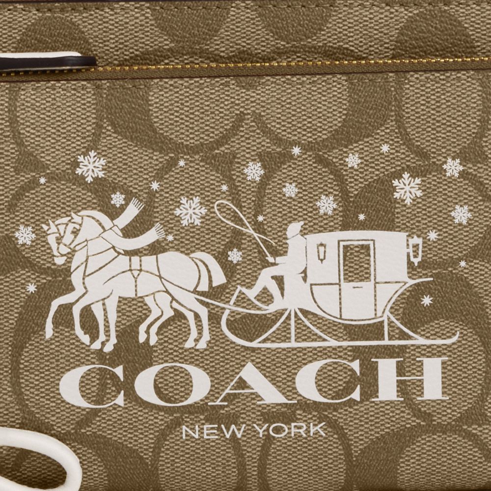 COACH®,DOUBLE ZIP WALLET IN SIGNATURE CANVAS WITH HORSE AND SLEIGH,Signature Canvas,Mini,Gold/Khaki/Chalk