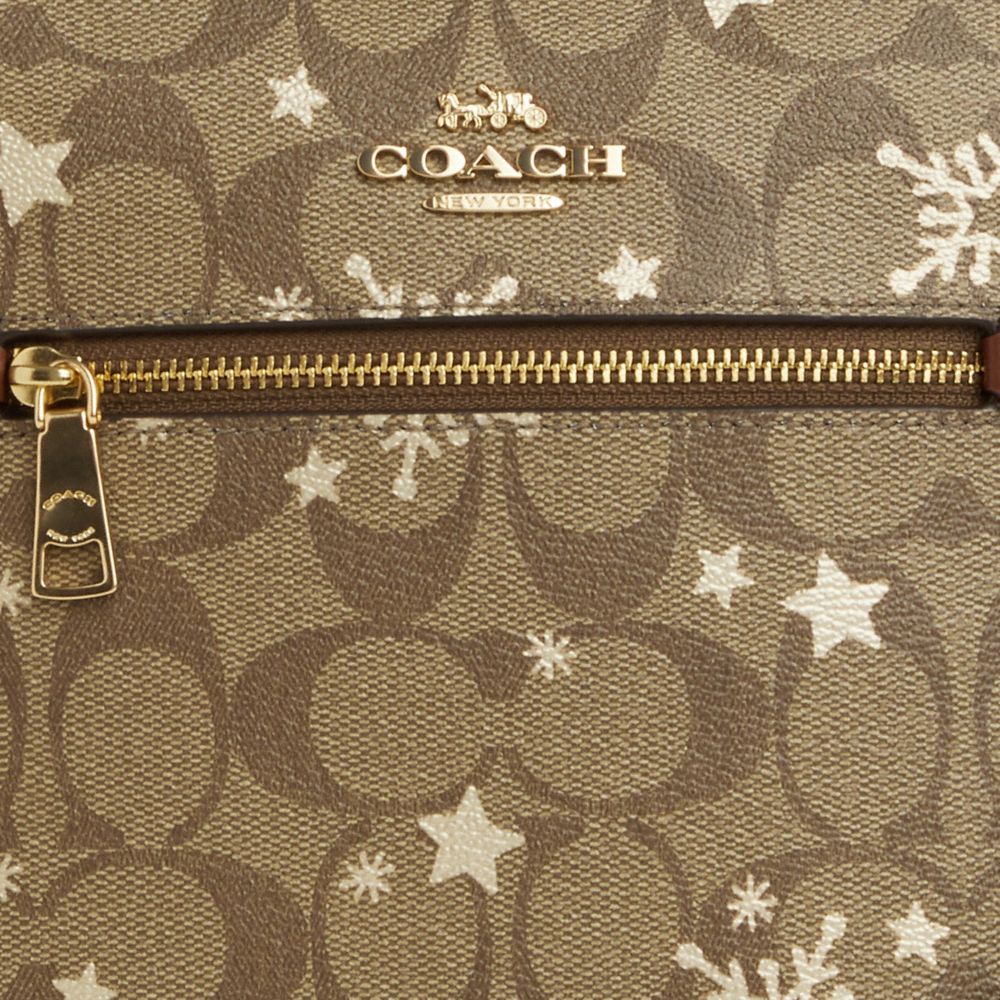 COACH®,Mini Rowan File Bag In Signature Canvas With Star And Snowflake Print,