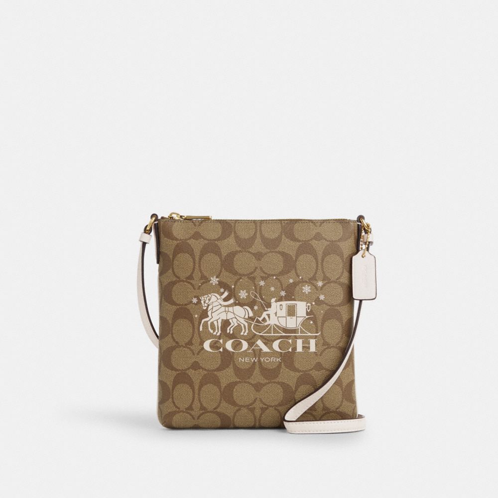 COACH® | Mini Rowan File Bag In Signature Canvas With Horse And Sleigh