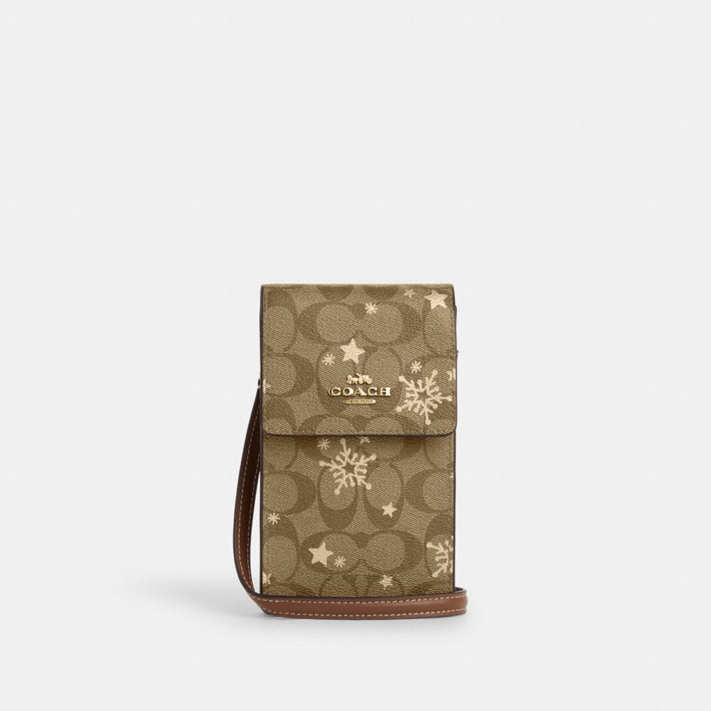 COACH®,NORTH SOUTH PHONE CROSSBODY IN SIGNATURE CANVAS WITH STAR AND SNOWFLAKE PRINT,Signature Canvas,Mini,Im/Khaki Saddle/Gold Multi,Front View