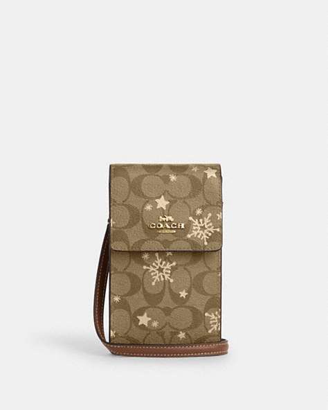 COACH®,NORTH SOUTH PHONE CROSSBODY IN SIGNATURE CANVAS WITH STAR AND SNOWFLAKE PRINT,Coated Canvas,Mini,Im/Khaki Saddle/Gold Multi,Front View