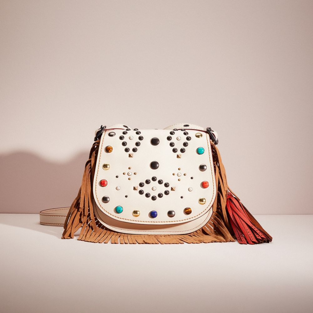 Coach fringe saddle online bag