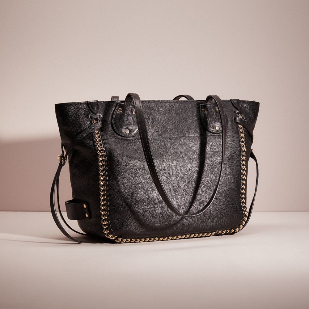 Coach whiplash online tote