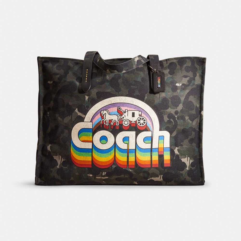 Fun camo reversible Coach tote!! - Amanda's Exchange