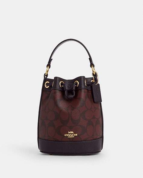 COACH®,DEMPSEY DRAWSTRING BUCKET BAG 15 IN SIGNATURE CANVAS,Coated Canvas,Gold/Oxblood Multi,Front View