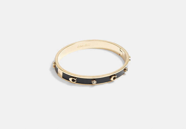 COACH®,SIGNATURE AND STONE HINGED BANGLE,Metal,Gold/Black,Front View image number 0