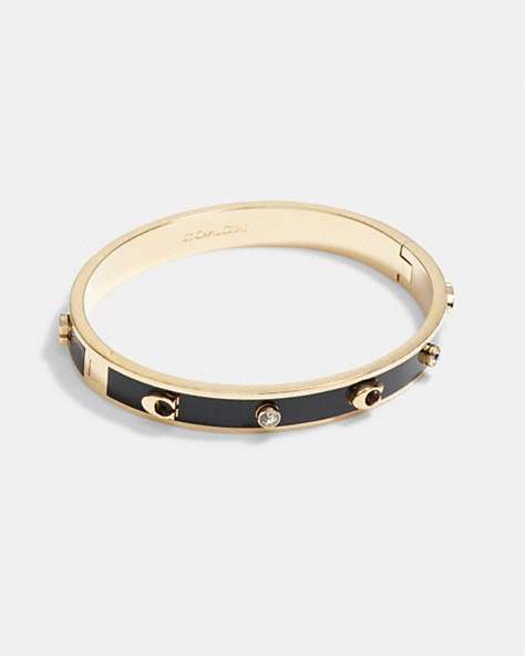 COACH®,SIGNATURE AND STONE HINGED BANGLE,Metal,Gold/Black,Front View