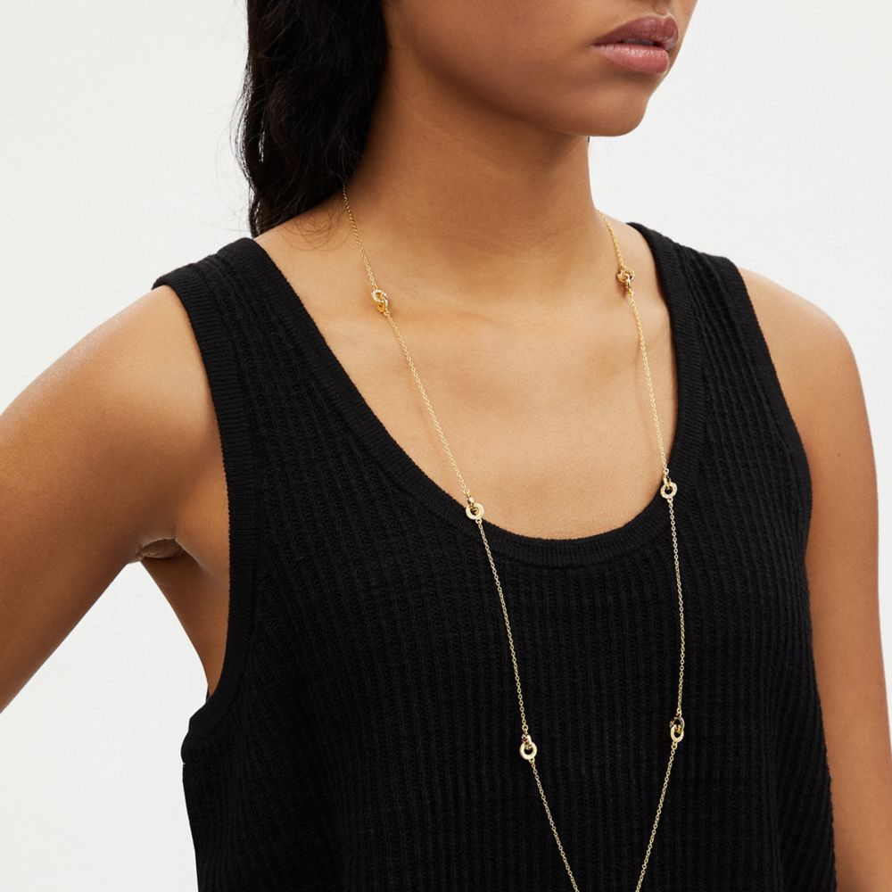 COACH® | Interlocking Open Circle Pearl Long Station Necklace