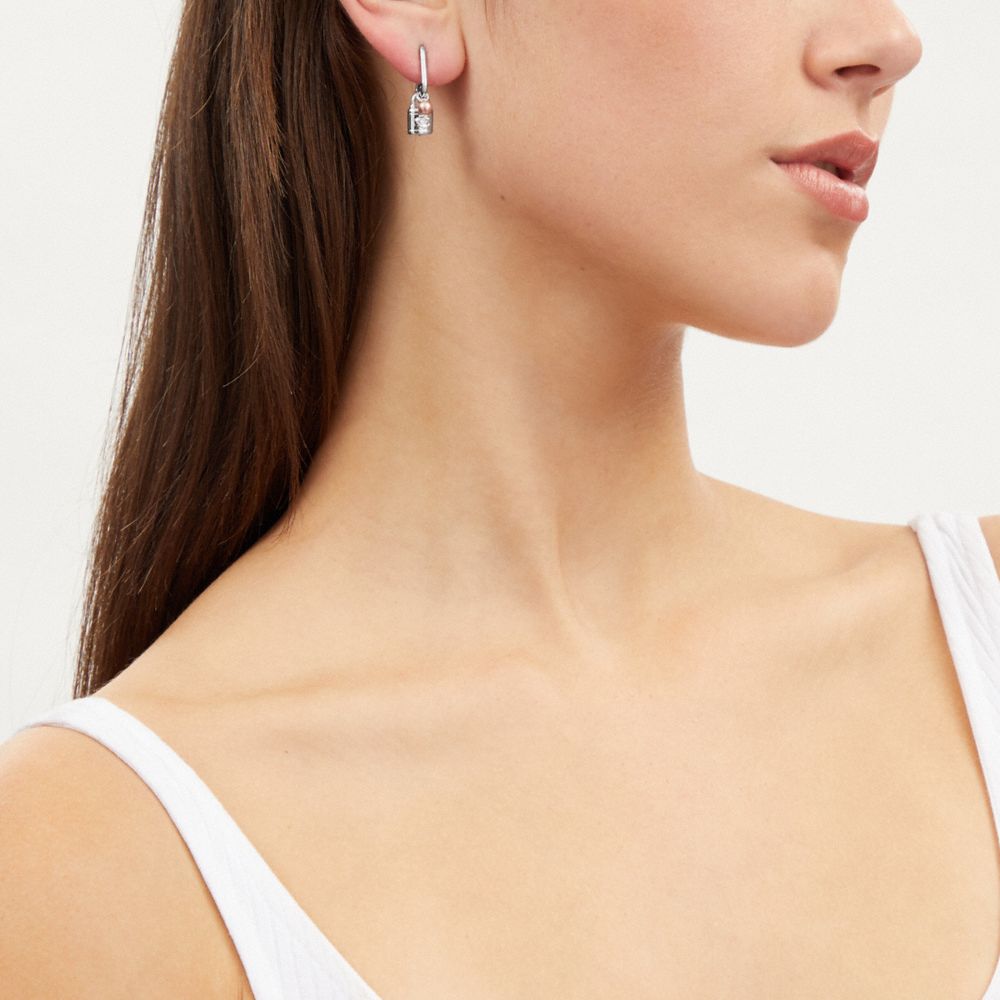 COACH Resin Huggie Earrings in White