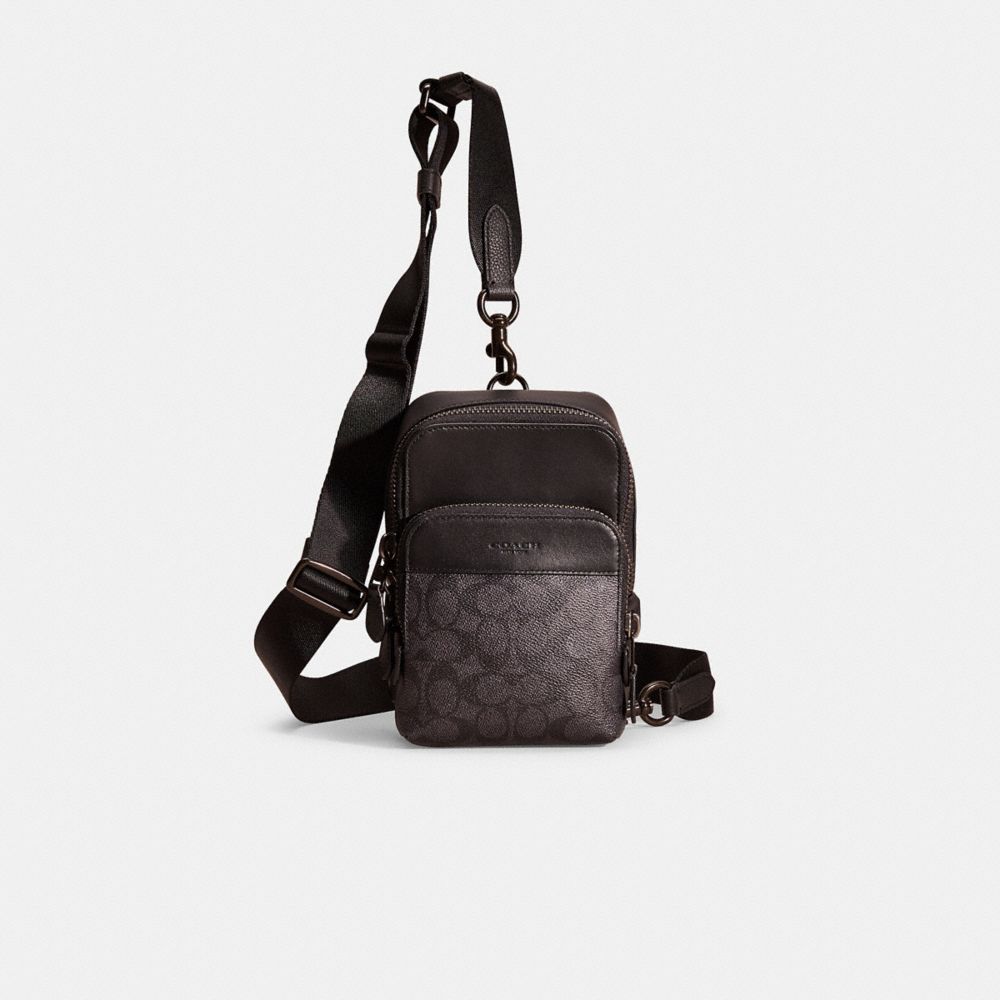 COACH®: Gotham Sling Pack 13 In Signature Canvas