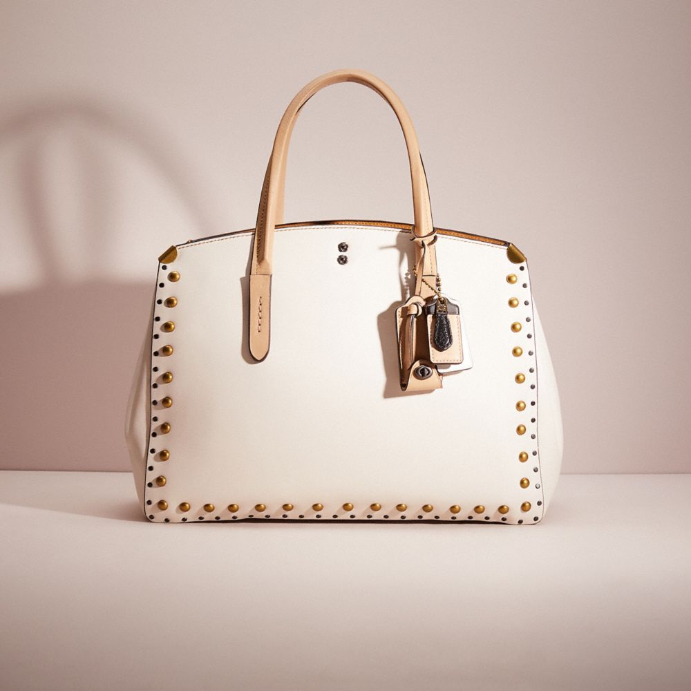 Coach cooper carryall store with rivets