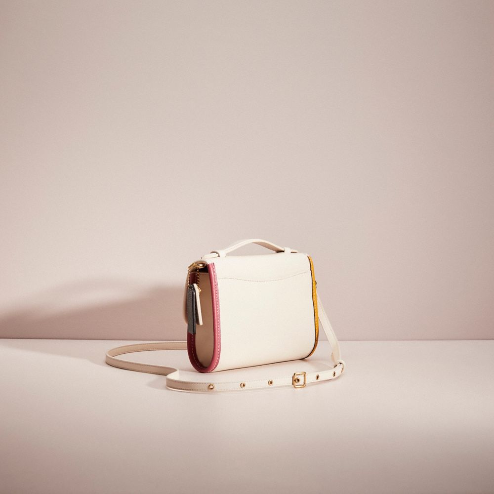 COACH®,Upcrafted Kip Turnlock Crossbody,Leather,Crossbody,Piping,Studded,Logo,Metal,Gold Metal,Day Party,Cream,Angle View