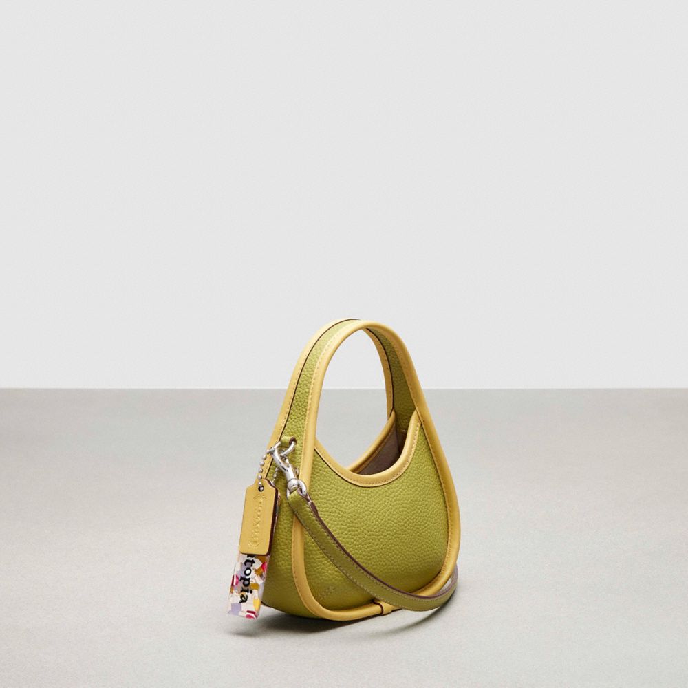 COACH®,Mini Ergo Bag With Crossbody Strap In Coachtopia Leather,Coachtopia Leather,Mini,Lime Green/Sunflower,Angle View