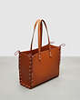 COACH®,The Re-Laceable Tote: Large,Coachtopia Leather,Large,Re Laceable Tote,Burnished Amber,Angle View