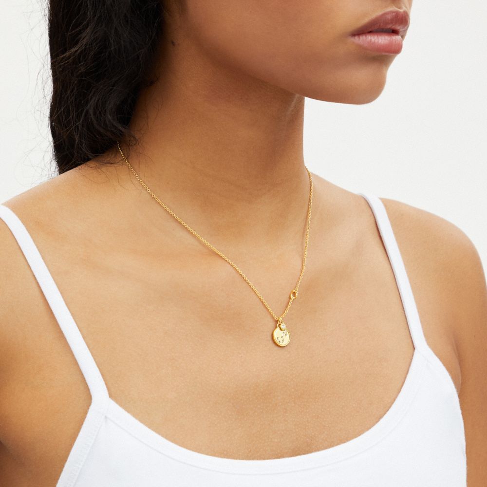 COACH®,SCORPIO COIN PENDANT NECKLACE,Gold,Detail View