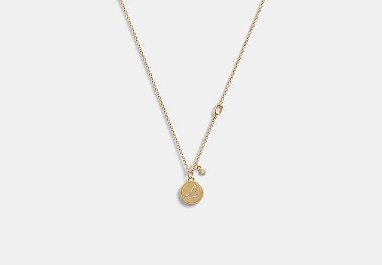 COACH®,CAPRICORN COIN PENDANT NECKLACE,Metal,Gold,Front View