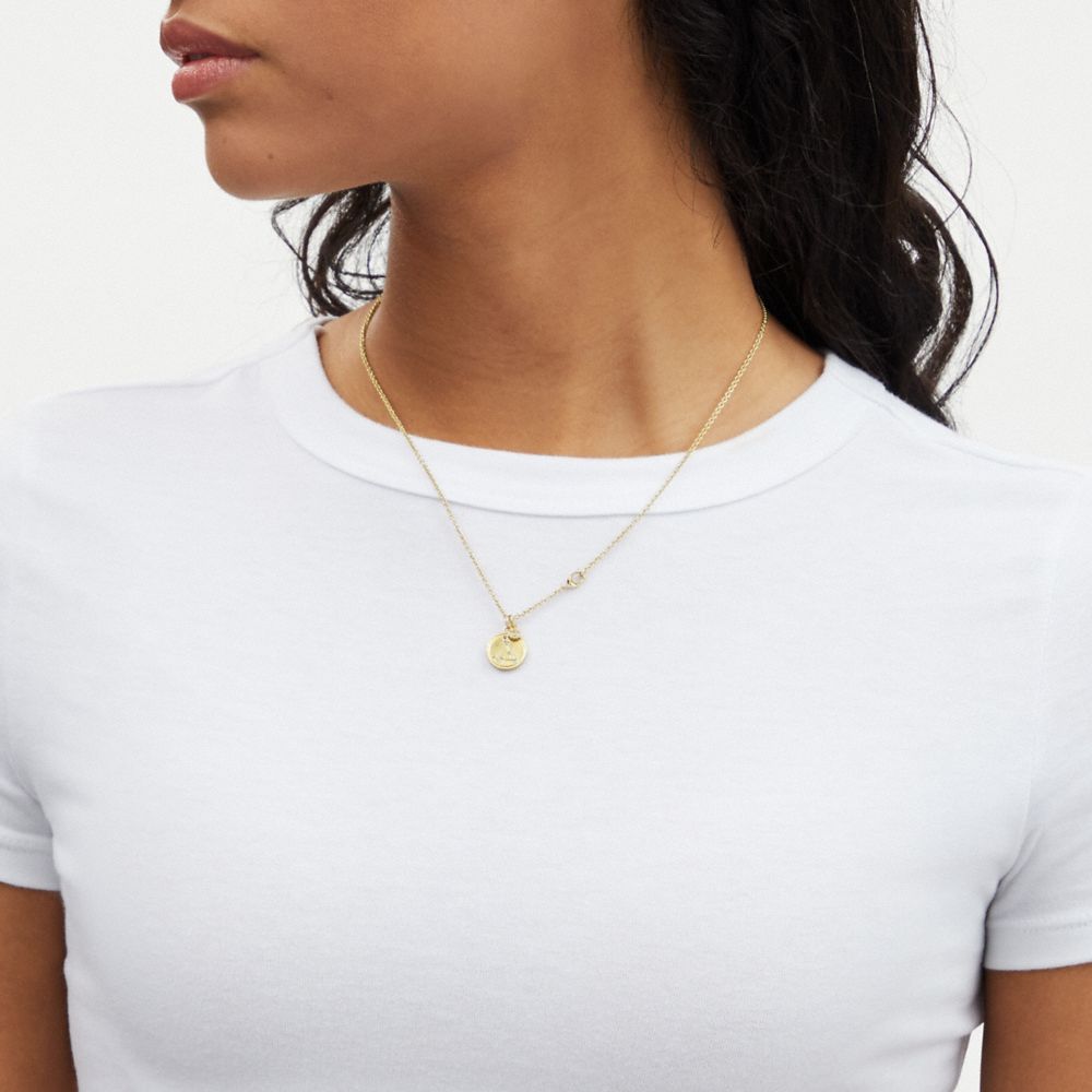 COACH®,PISCES COIN PENDANT NECKLACE,Gold,Detail View