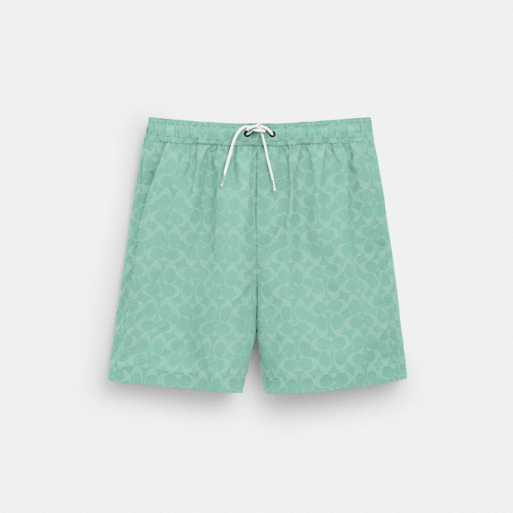 Shop Coach Outlet Signature Swim Trunks In Blue