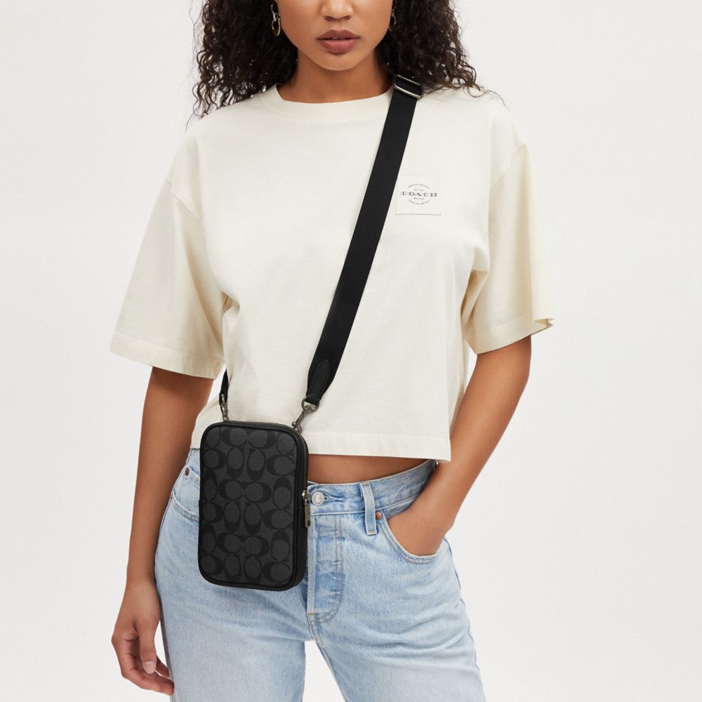 COACH®,Aden Crossbody Bag In Signature Canvas,Canvas,Mobile Bag,Logo,Piping,Casual,Multi Color,Angle View