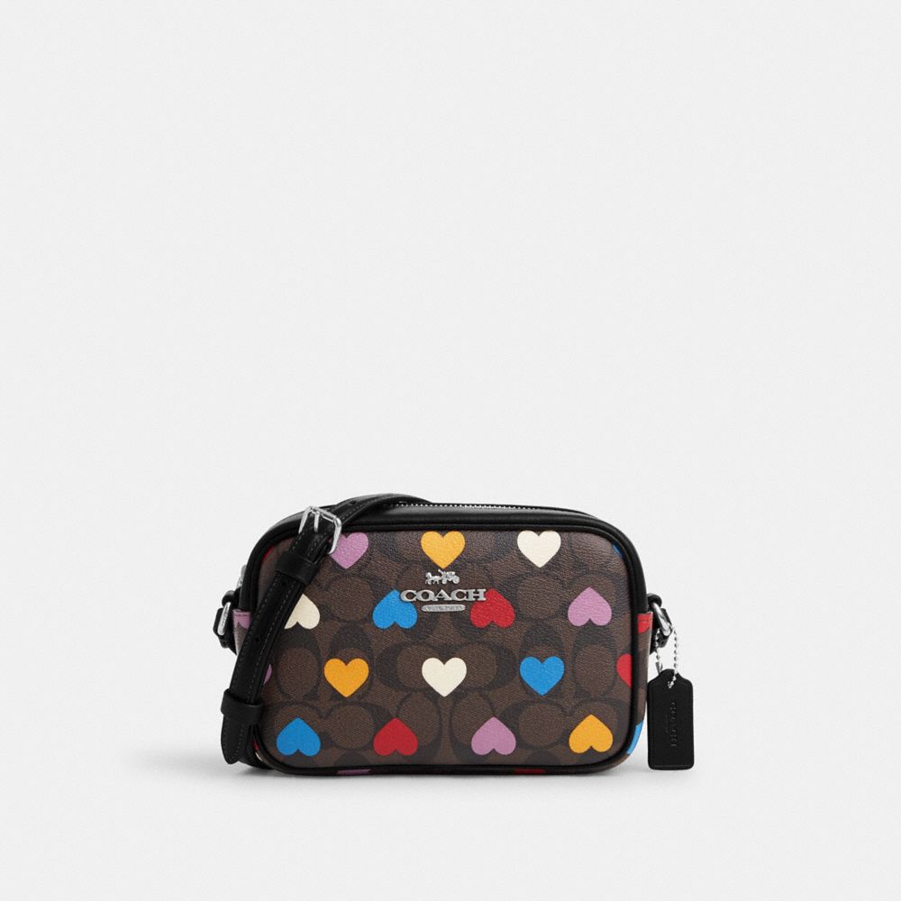 COACH®,MINI JAMIE CAMERA BAG IN SIGNATURE CANVAS WITH HEART PRINT,Signature Canvas,Small,Silver/Brown Black Multi,Front View