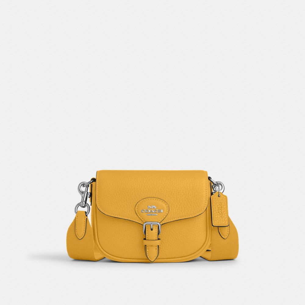 Shop Coach Outlet Amelia Small Saddle Bag In Yellow