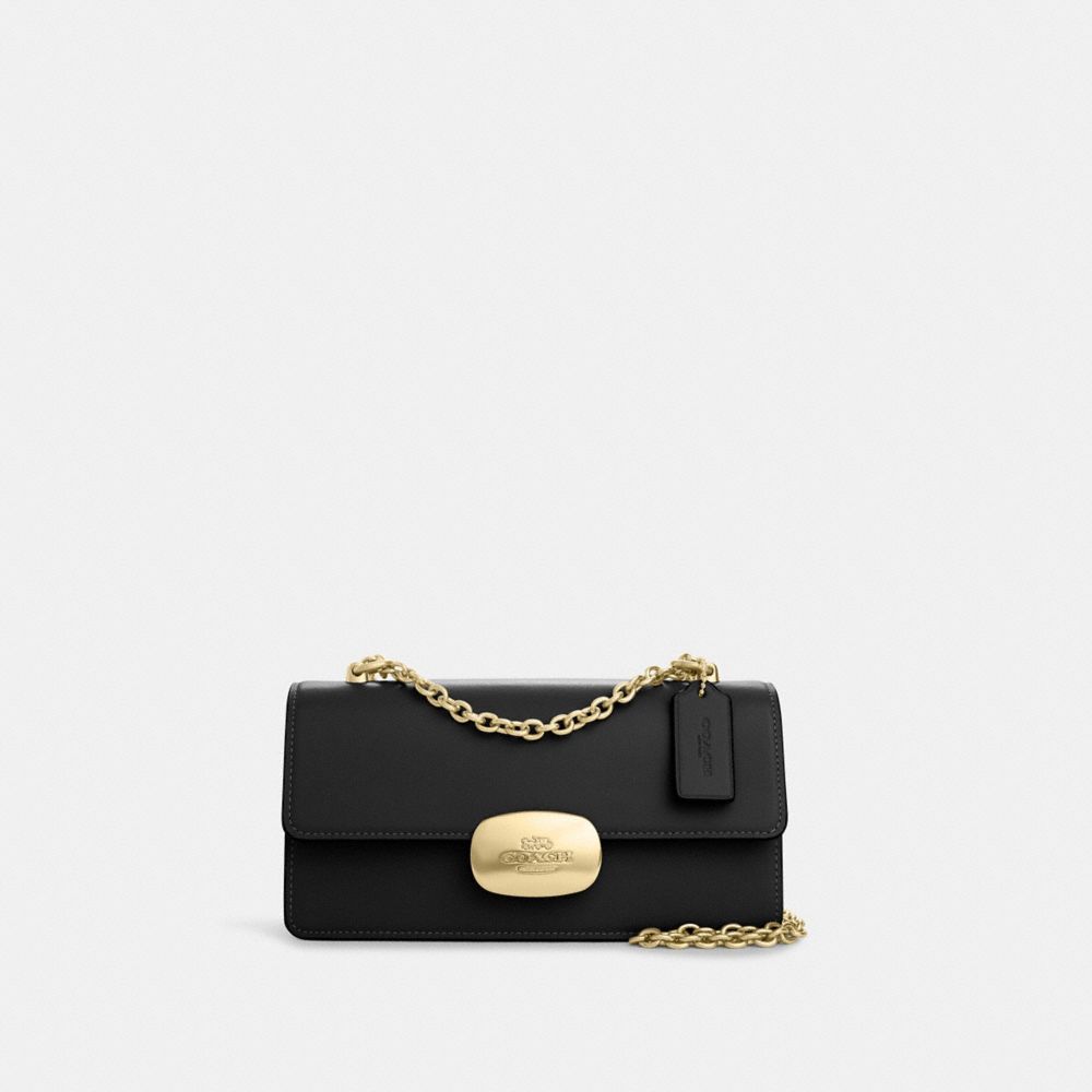 Black and cheap gold coach purse