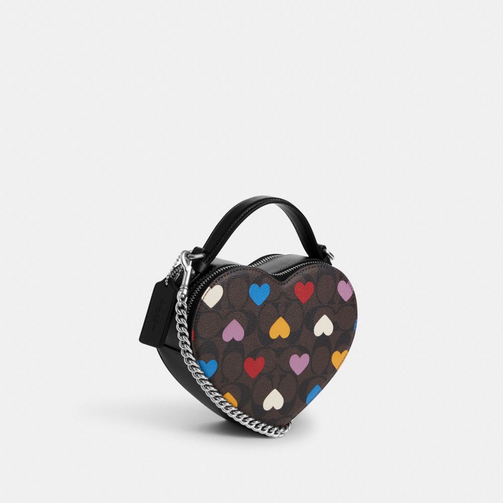 COACH®,HEART CROSSBODY IN SIGNATURE CANVAS WITH HEART PRINT,Signature Canvas,Small,Silver/Brown Black Multi,Angle View