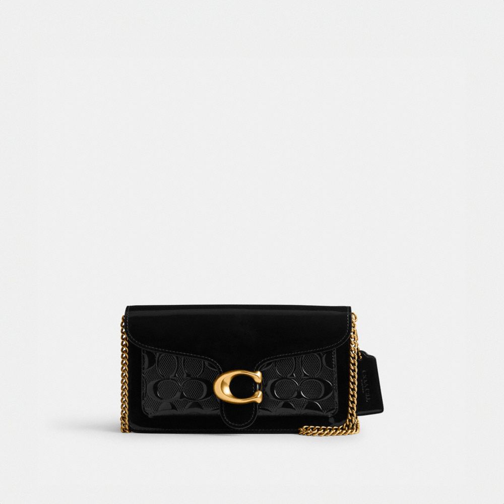 Coach store signature clutch