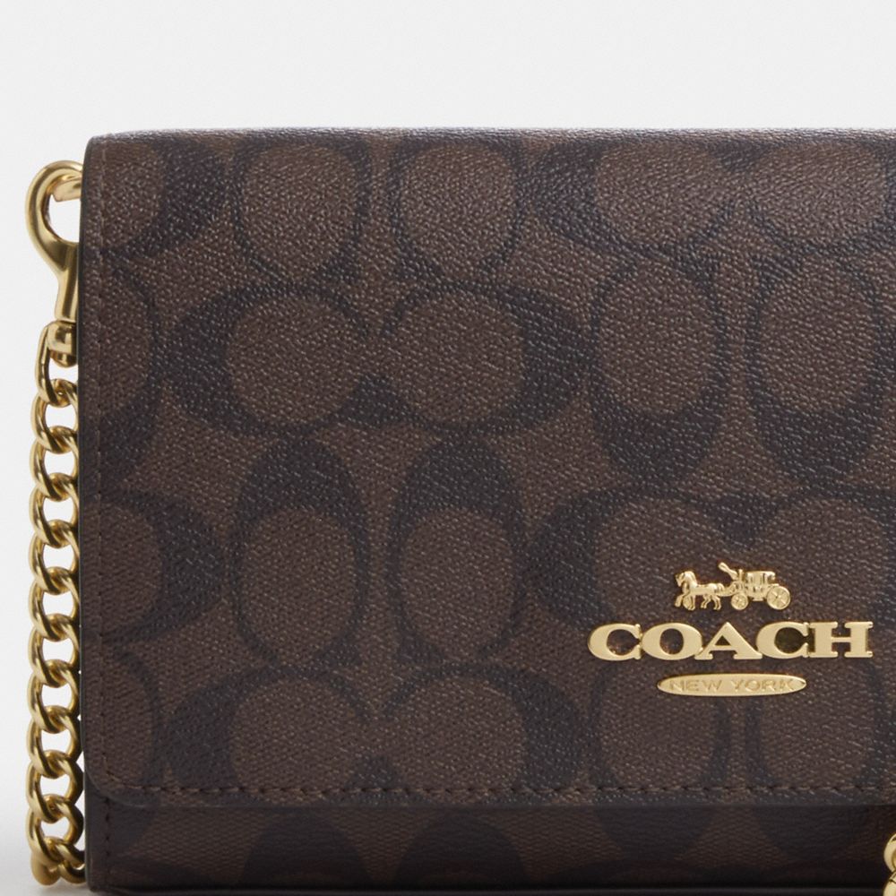 COACH®,Flap Clutch Crossbody In Signature Canvas,Canvas,Leather,Crossbody,PVC,Logo,Gusset,Gold Metal,Day Party,Brown