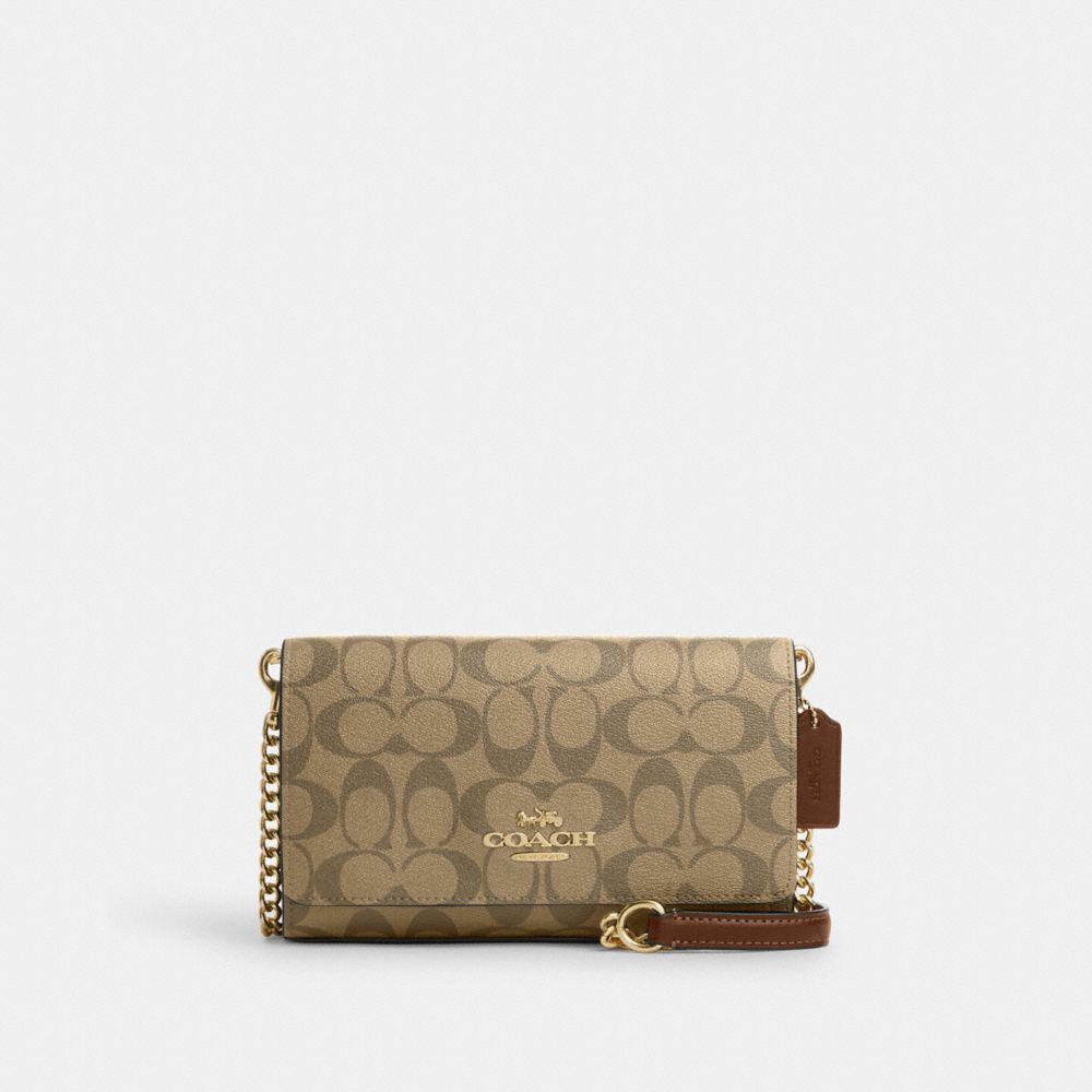 COACH®,FLAP CLUTCH CROSSBODY IN SIGNATURE CANVAS,Signature Canvas,Mini,Gold/Khaki Saddle 2,Front View