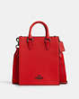 COACH®,DYLAN TOTE IN COLORBLOCK SIGNATURE CANVAS,Silk,Medium,Black Antique Nickel/Bright Poppy/Charcoal,Front View