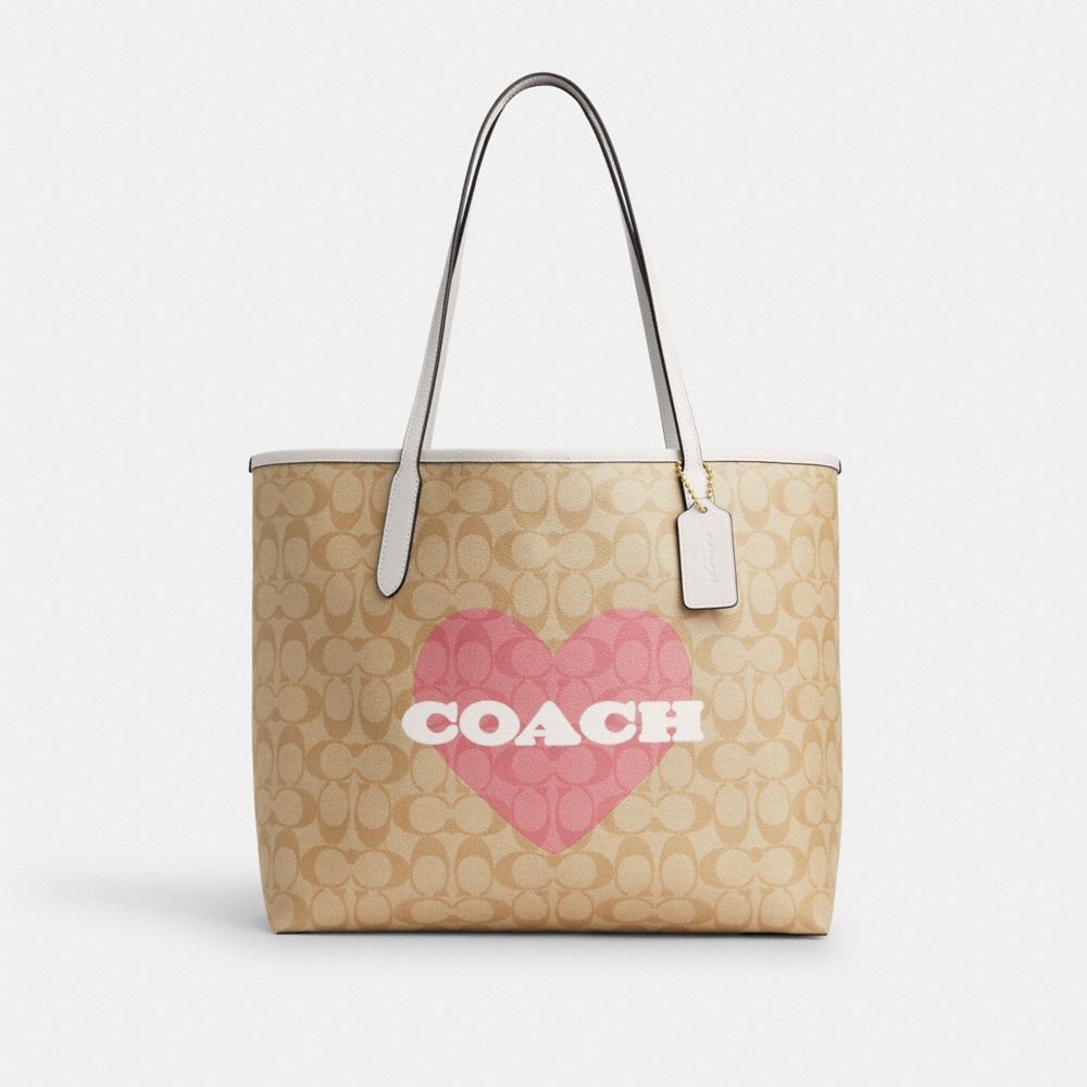COACH®,CITY TOTE BAG IN SIGNATURE CANVAS WITH HEART PRINT,Signature Canvas,X-Large,Gold/Light Khaki Chalk Multi,Front View