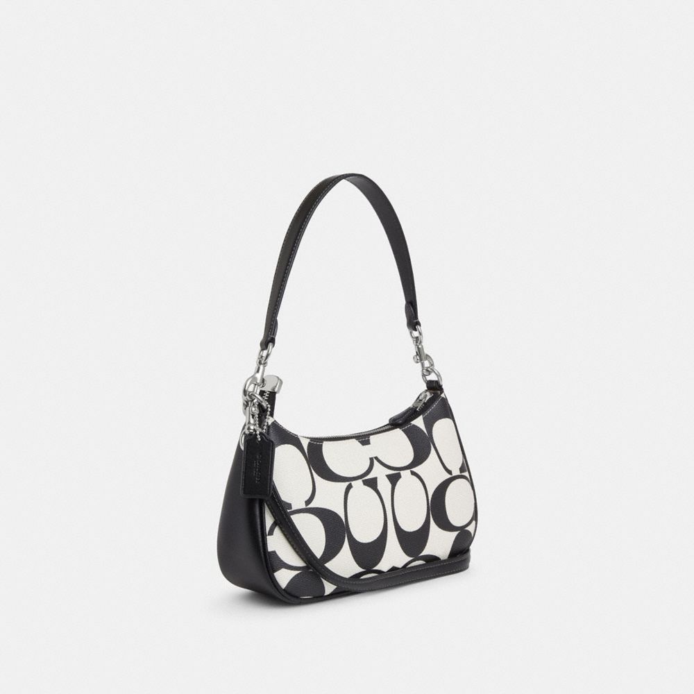 COACH®,Teri Shoulder Bag In Signature Canvas,,Angle View