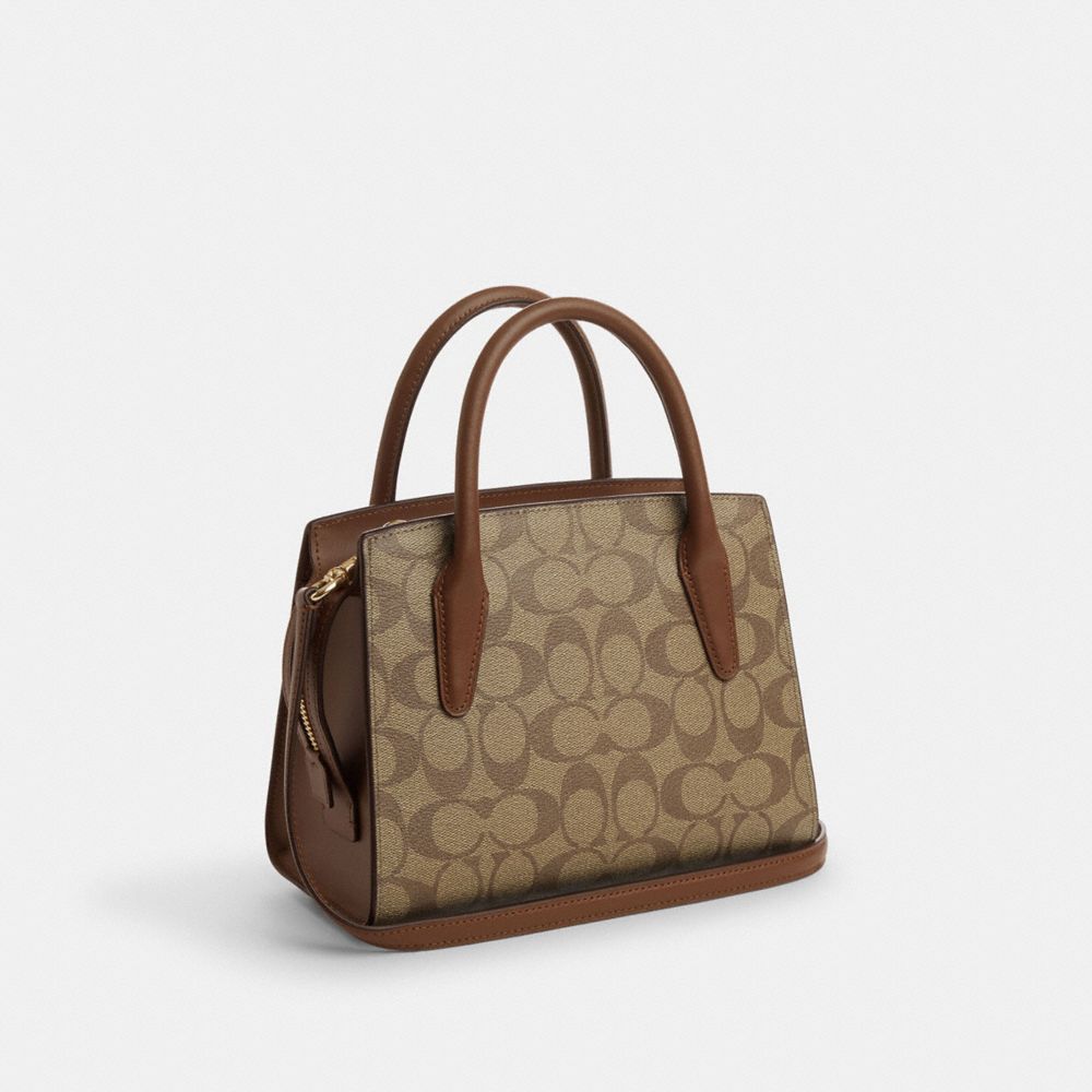 COACH®,ANDREA CARRYALL BAG IN SIGNATURE CANVAS,Signature Canvas,Medium,Gold/Khaki Saddle 2,Angle View