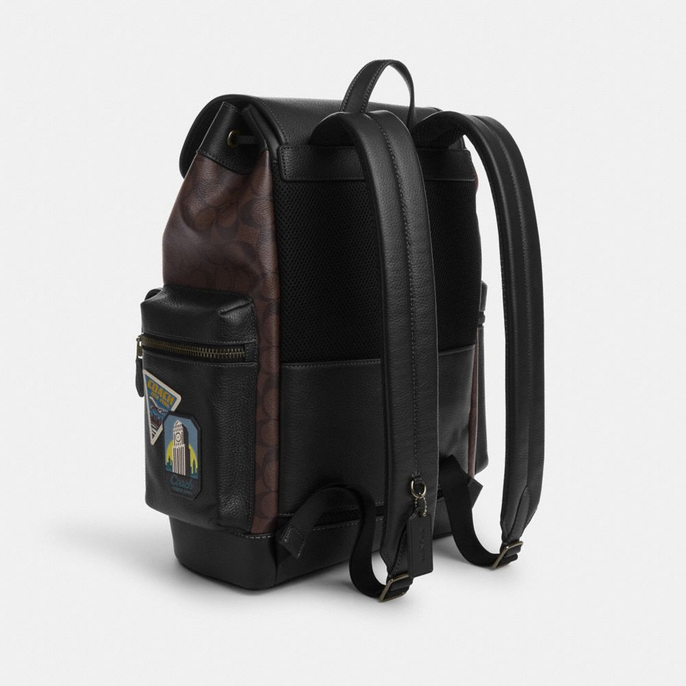 COACH®,Sprint Backpack In Signature Canvas With Travel Patches,,Angle View