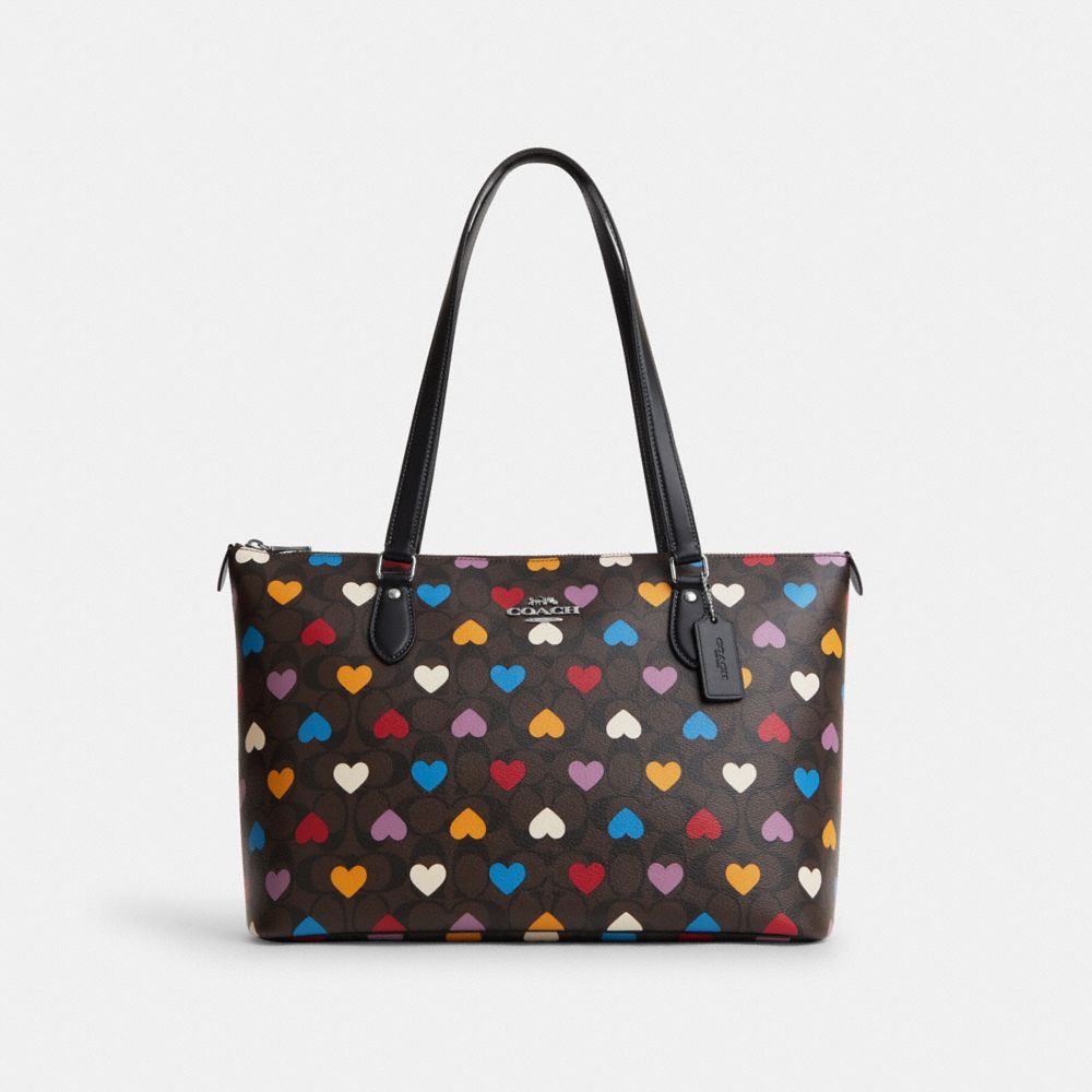 COACH®,GALLERY TOTE BAG IN SIGNATURE CANVAS WITH HEART PRINT,Signature Canvas,Large,Silver/Brown Black Multi,Front View