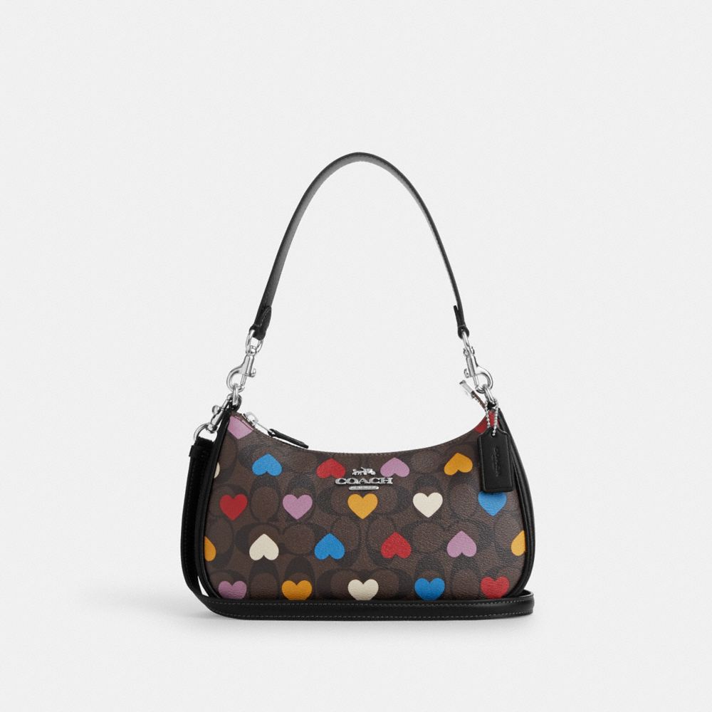 COACH®,TERI SHOULDER BAG IN SIGNATURE CANVAS WITH HEART PRINT,pvc,Medium,Silver/Brown Black Multi,Front View