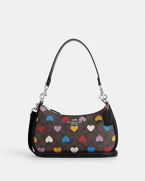 COACH®,TERI SHOULDER BAG IN SIGNATURE CANVAS WITH HEART PRINT,pvc,Medium,Silver/Brown Black Multi,Front View
