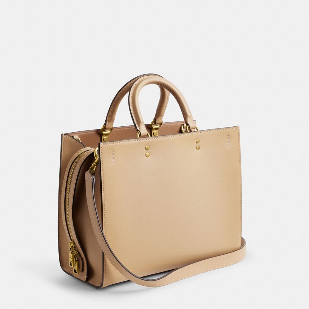 COACH®,ROGUE BAG,Glovetan Leather,Large,Brass/Beige,Angle View