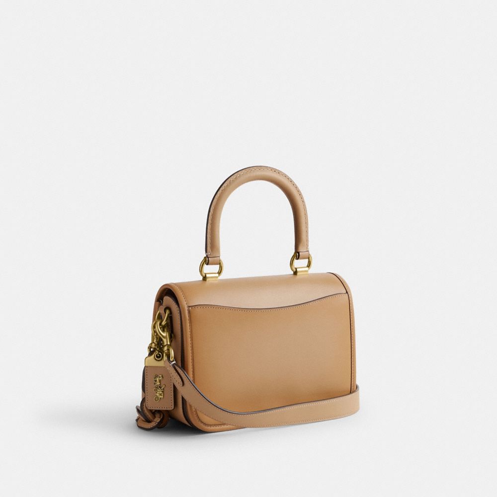COACH®,ROGUE TOP HANDLE BAG,Glovetan Leather,Mini,Brass/Beige,Angle View