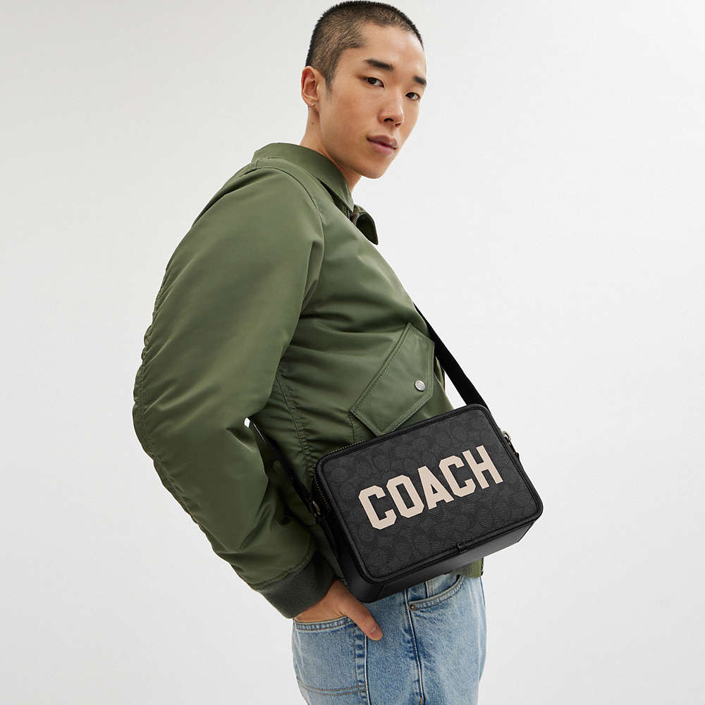 Shop Coach Charter Crossbody Bag 24 In Signature Canvas With  Graphic In Charcoal Multi