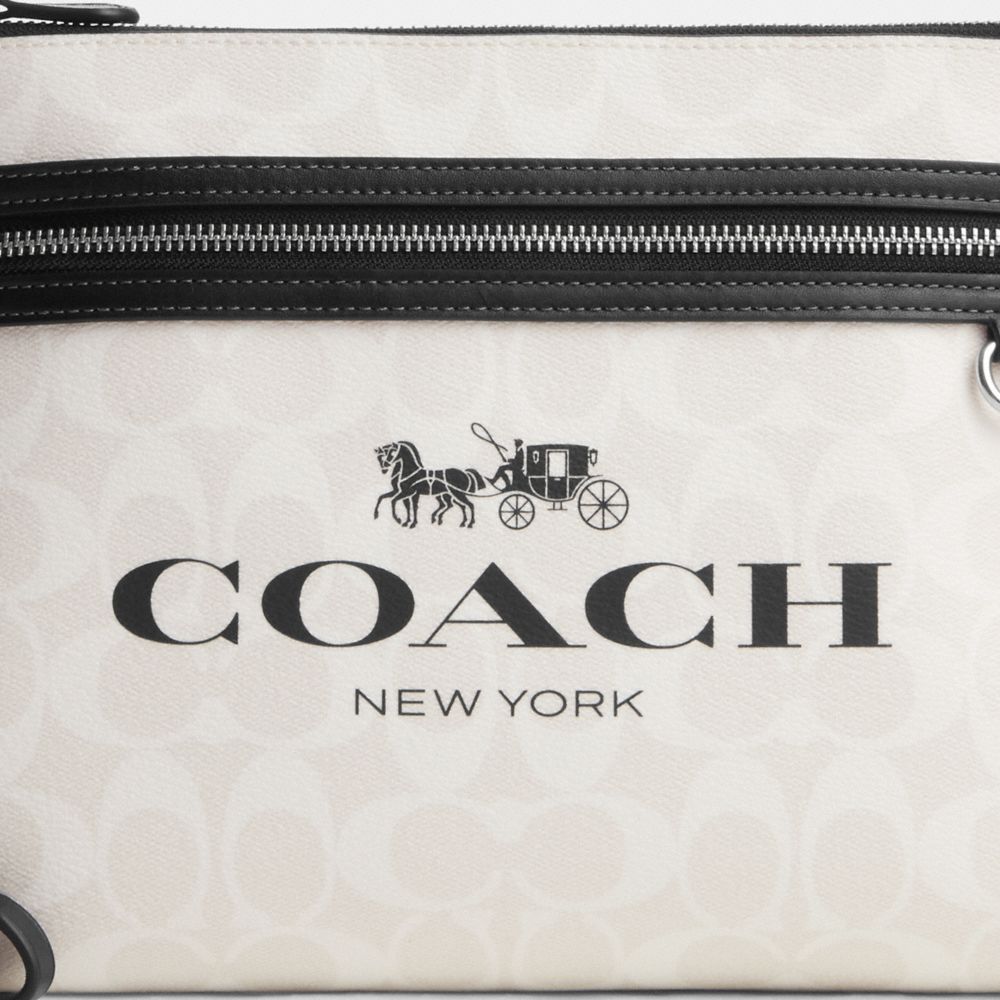 COACH®,キャリー オール ポーチ・シグネチャー キャンバス,クラッチバッグ&ポーチ,