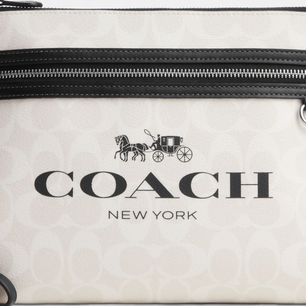 COACH®,Carry All Pouch In Signature Canvas,