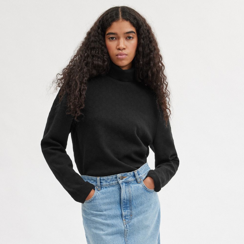 COACH®,Signature Turtleneck,Black,Scale View