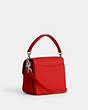 COACH®,CASSIE CROSSBODY 19 WITH HEART STRAP,Polished Pebble Leather,Medium,Silver/Sport Red,Angle View