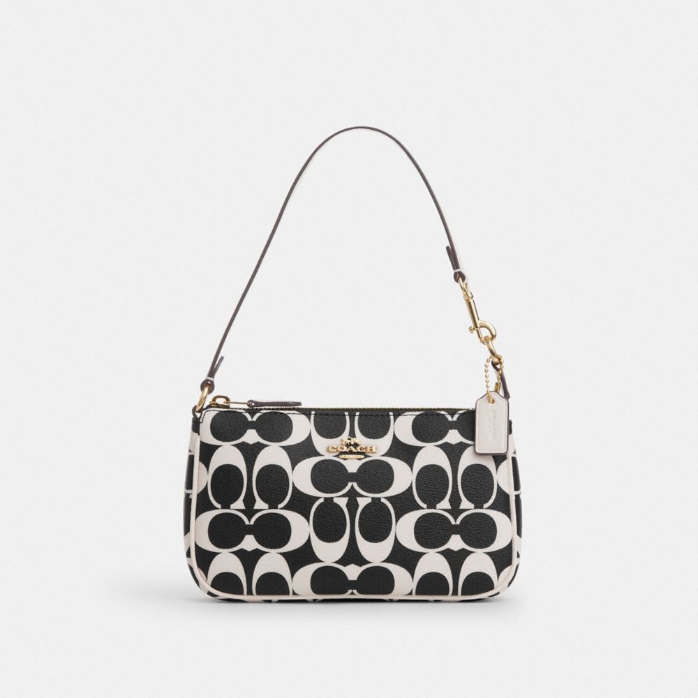 Black and white store coach bag