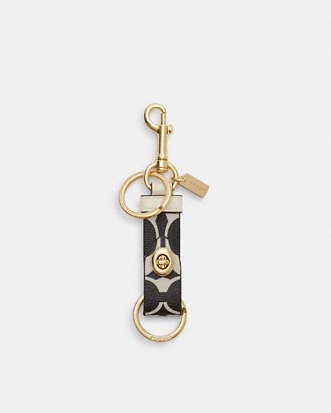 COACH®,TRIGGER SNAP BAG CHARM IN SIGNATURE CANVAS,canvas,Gold/Black Multi,Front View