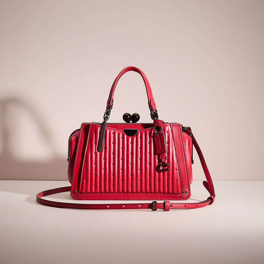 Shop Coach Restored Kisslock Dreamer 21 With Quilting And Rivets In Pewter/red Apple