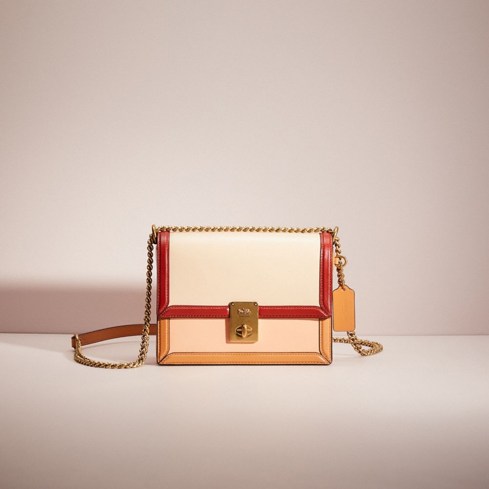 COACH®,RESTORED HUTTON SHOULDER BAG IN COLORBLOCK,Refined Calf Leather,Brass/Ivory Blush Multi,Front View